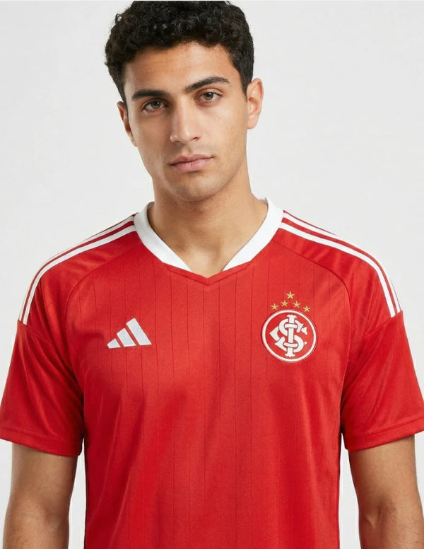 internacional maglia home 2026 2027 adidas rossa strisce bianche stemma colorado