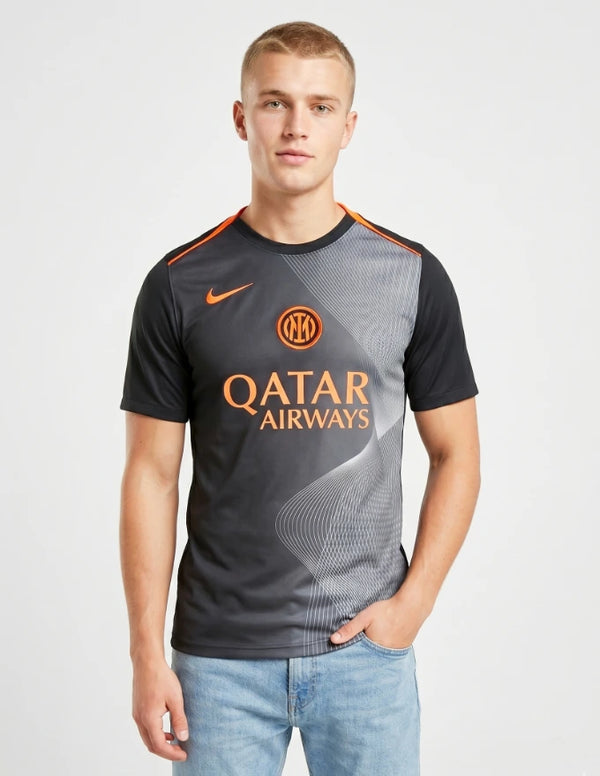 Inter maglia pre match terza 2025/2026 Nike grafite con pattern a onde bianche e dettagli arancio fluo