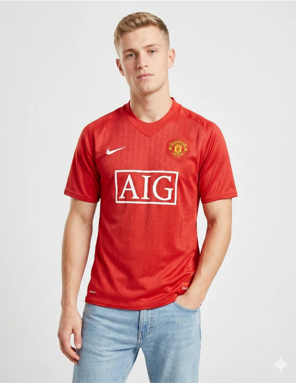 Maglia Manchester United Home 2007/2008 Nike rossa con sponsor AIG bianco e pattern righe tono su tono