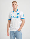 Maglia Napoli Away 2026/2027 EA7 bianca con dettagli azzurri e colletto a V indossata