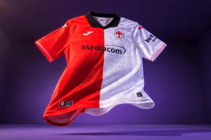 Maglia Fiorentina Centenario 2026/2027 Joma con stemma del giglio, colletto nero e grafica celebrativa dei 100 anni