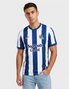 Maglia Real Sociedad Home 2026/2027 Joma blu e bianca a righe con sponsor Baghdadi Capital