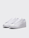 Coppia Adidas Stan Smith Bianche vista tre quarti tomaia e suola bianca