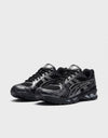 Asics Gel-Kayano 14 Black Pure Silver profilo con suola Gel visibile sul tallone