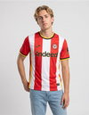 Maglia Brentford Home 2026/2027 Joma rossa e bianca a righe con sponsor Indeed