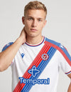 Crystal Palace Maglia Home 2026/2027 - dettaglio sash e colletto