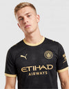 Seconda maglia Manchester City Puma nera pattern api dorate – fronte primo piano