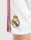 Pantaloncino Real Madrid Home Bambino 2026/2027 Adidas bianco con stemma e striscia bordeaux laterale