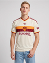 Maglia AS Roma Away 2026/2027 adidas bianca con colletto a V giallorosso indossata a figura intera