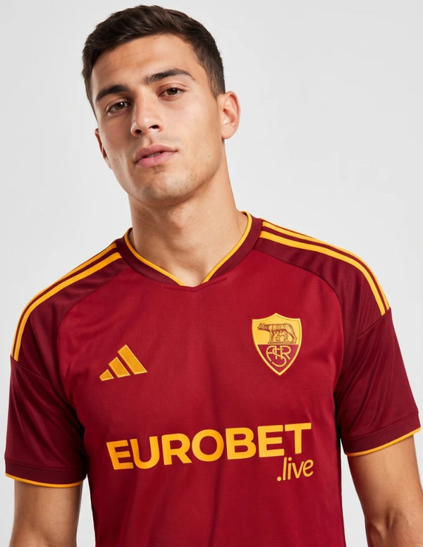 Maglia AS Roma Home 2026/2027 adidas rossa con Lupa Capitolina dorata e sponsor Eurobet