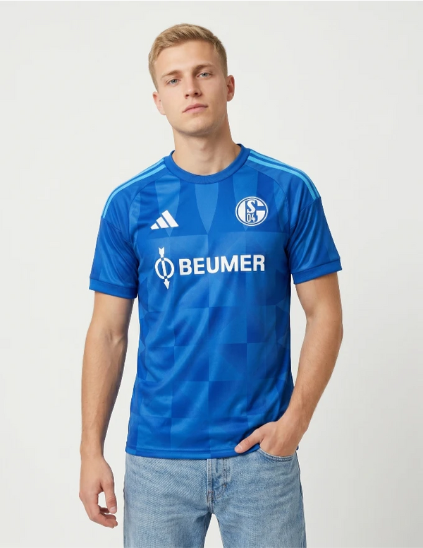 Schalke 04 maglia home 2026/2027 Adidas blu reale con pattern a scacchi tono su tono e sponsor Beumer bianco